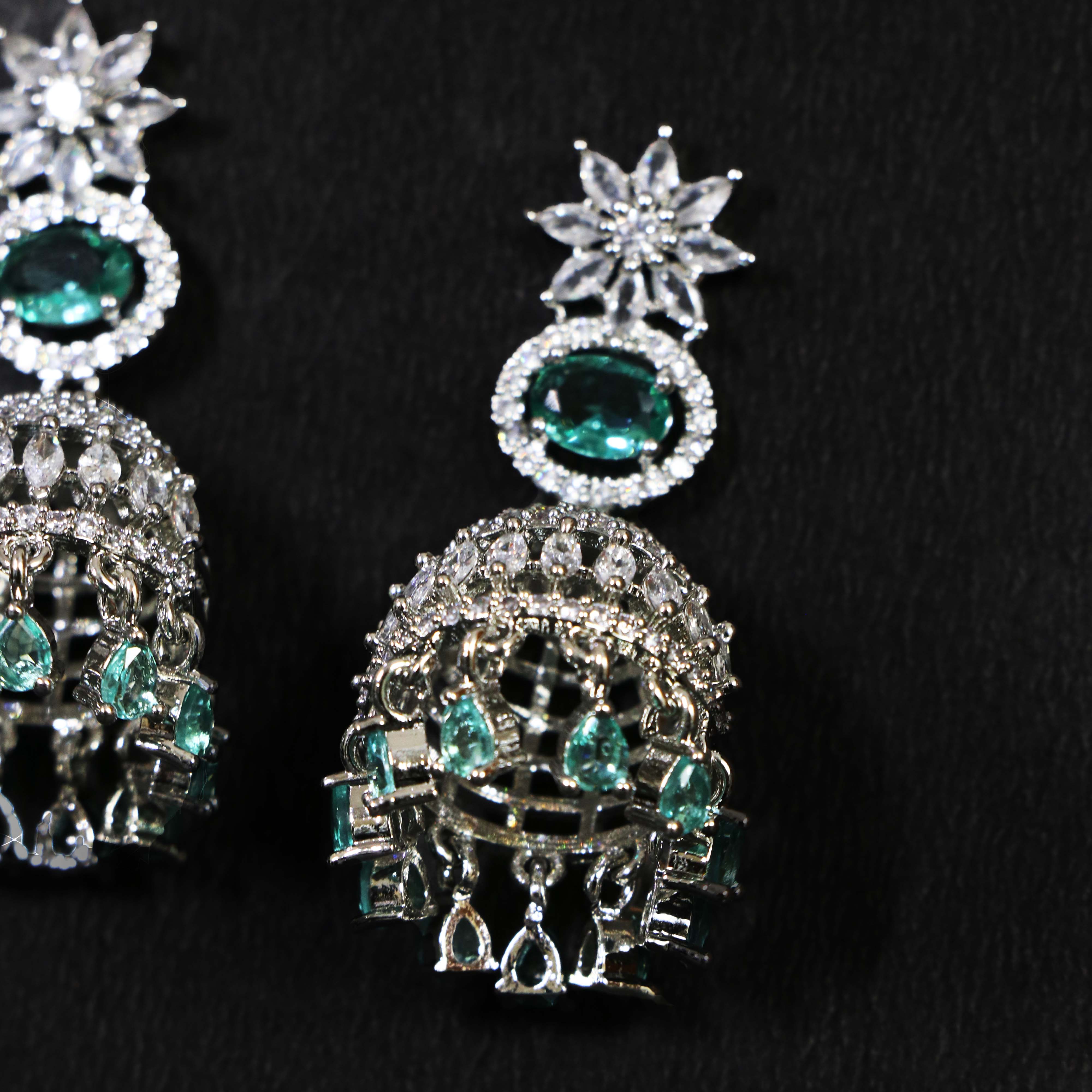 Emerald Jhumka Earrings With Floral Accents