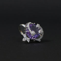 Luxurious Purple Amethyst Ring Surrounded by Silver Stones