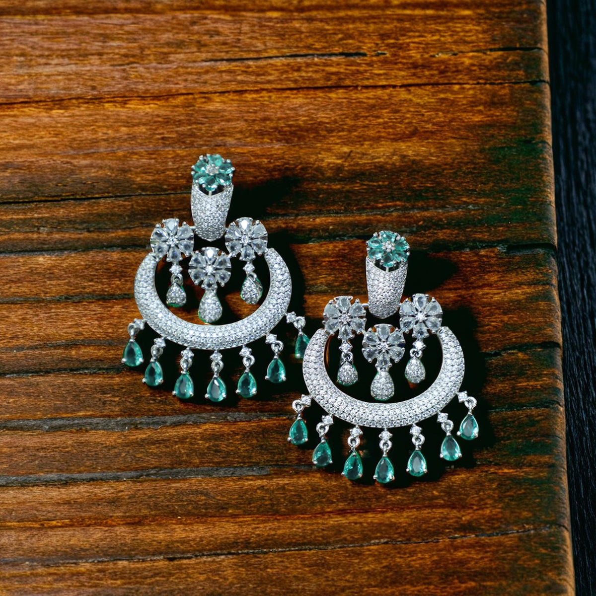 Celestial Jhumka Earrings with Emerald Accents